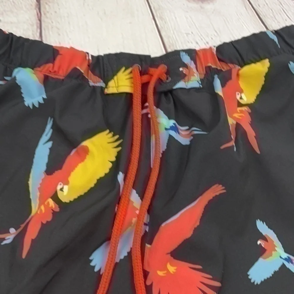 UEC men’s XL parrot swim trunks by No Retreat